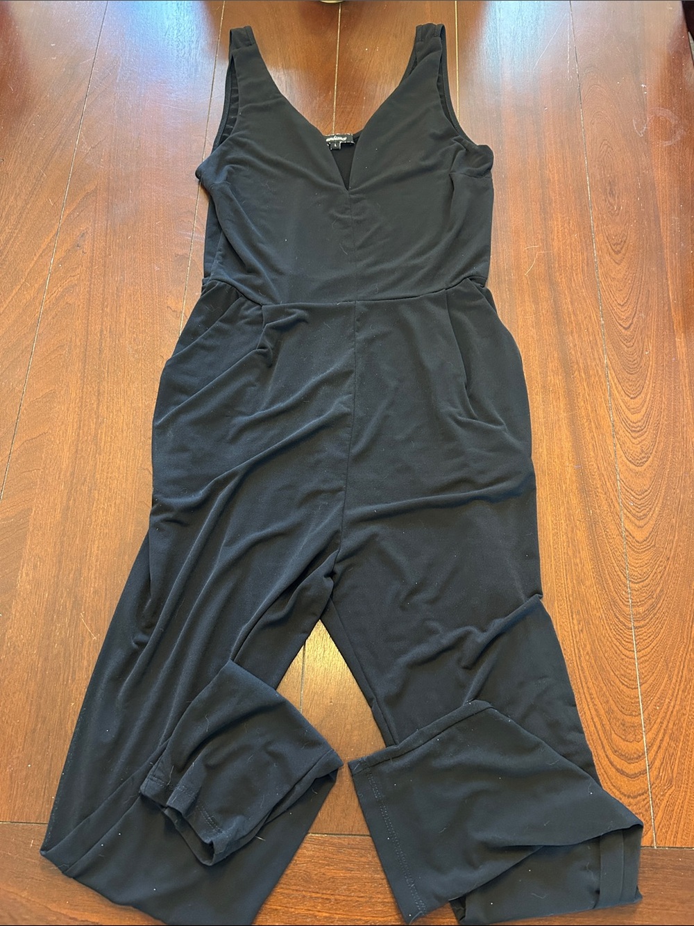 Ambiance Black V‑Neck Sleeveless Jumpsuit
